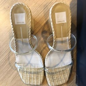 Woven 3 inch heel with clear straps.